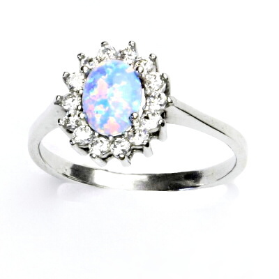 Zlatý prsten, bílé i žluté zlato,Kate, syntetický světle modrý opál,čiré zirkony, T 1507