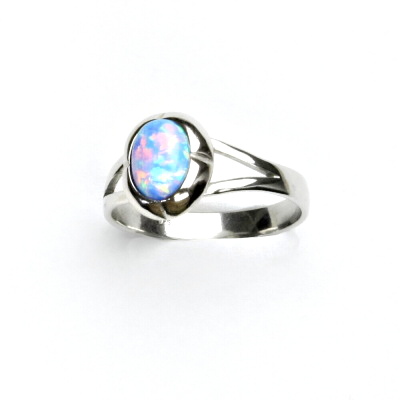 Zlatý prsten, bílé i žluté zlato,světle modrý syntetický opál - T 1374