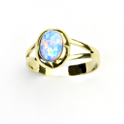 Zlatý prsten, žluté i bílé zlato, světle modrý syntetický opál - T 1374