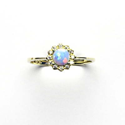 Zlatý prsten, žluté zlato, světle modrý syntetický opál, čiré zirkony, T 1495