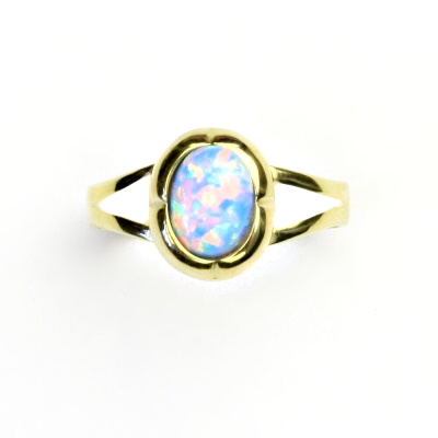 Zlatý prsten, žluté i bílé zlato, světle modrý syntetický opál - T 1374