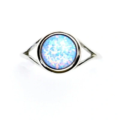 Zlatý prsten, bílé i žluté zlato, syntetický světle modrý opál - T 1503