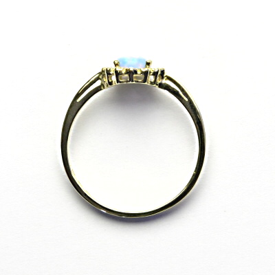 Zlatý prsten, žluté zlato, světle modrý syntetický opál, čiré zirkony, T 1495