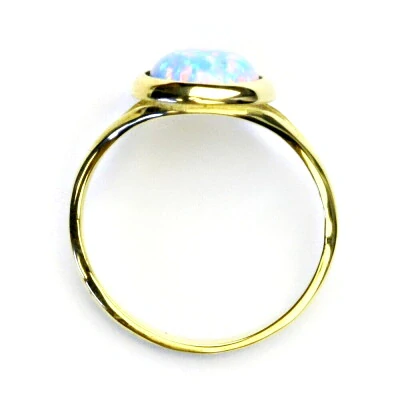 Zlatý prsten, žluté i bílé zlato, syntetický světle modrý opál - T 1503