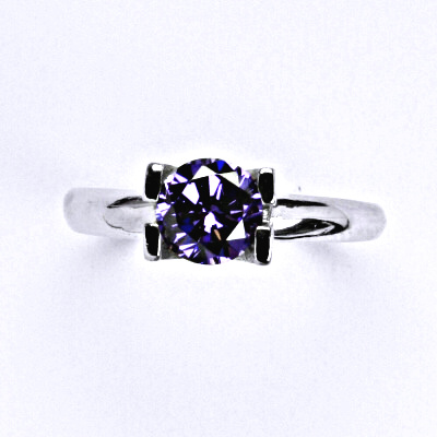 Stříbrný prsten se syntetickým ametystem, T 1273