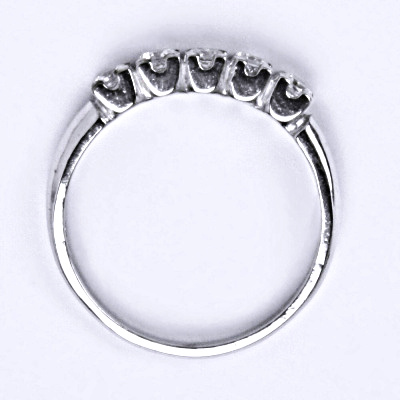 Stříbrný prsten s čirými zirkony, T 1392